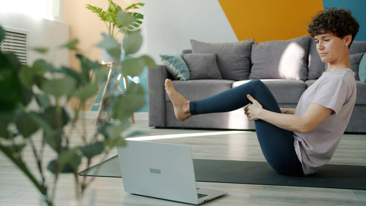 Hand holding a phone showing meditation app tips