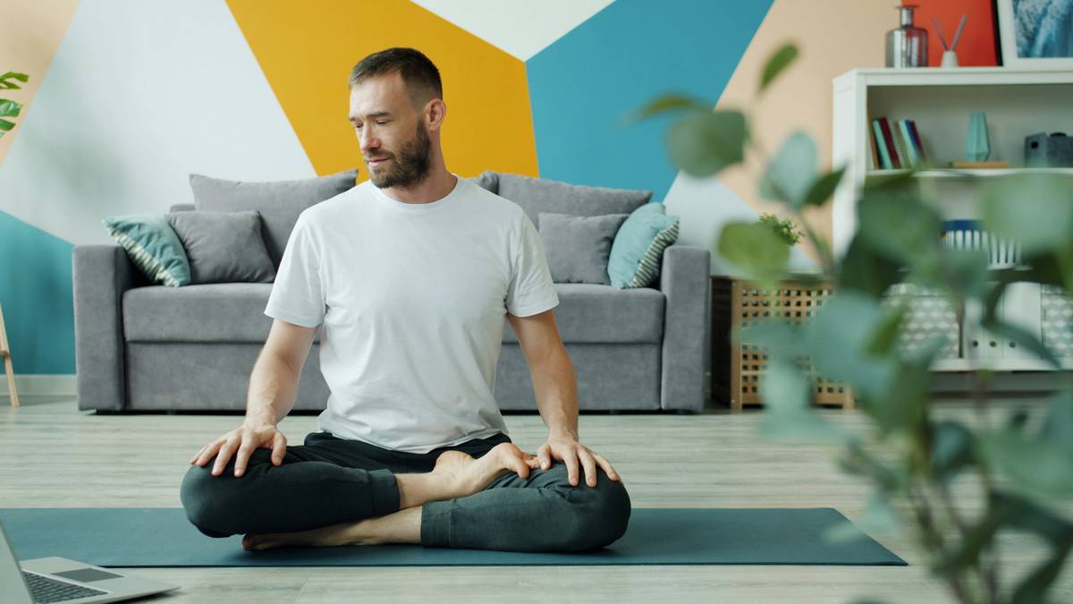 Woman smiling after completing a mindful meditation session